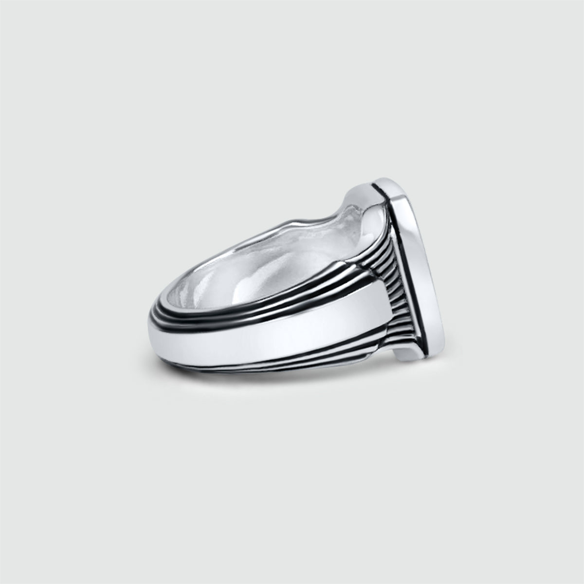 An engraved Bariq sterling silver mens signet ring with black and white stripes, a stylish choice for him.